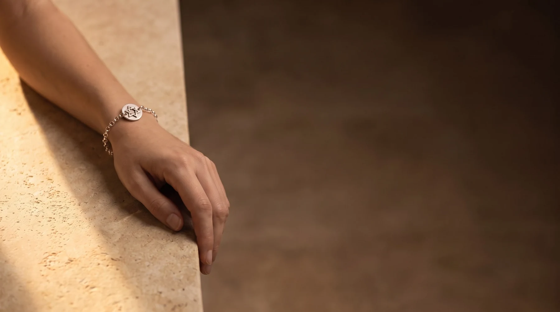 The Raised Star of David bracelet worn on the wrist