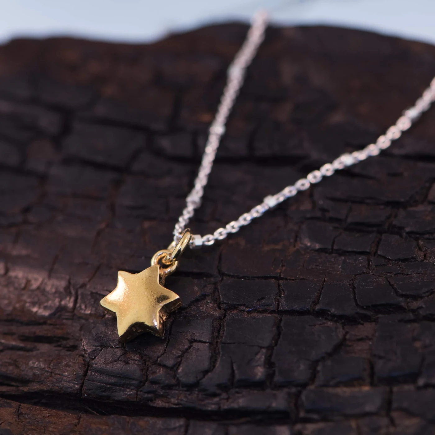 Teeny tiny Star of David charm in gold, on a fine silver chain