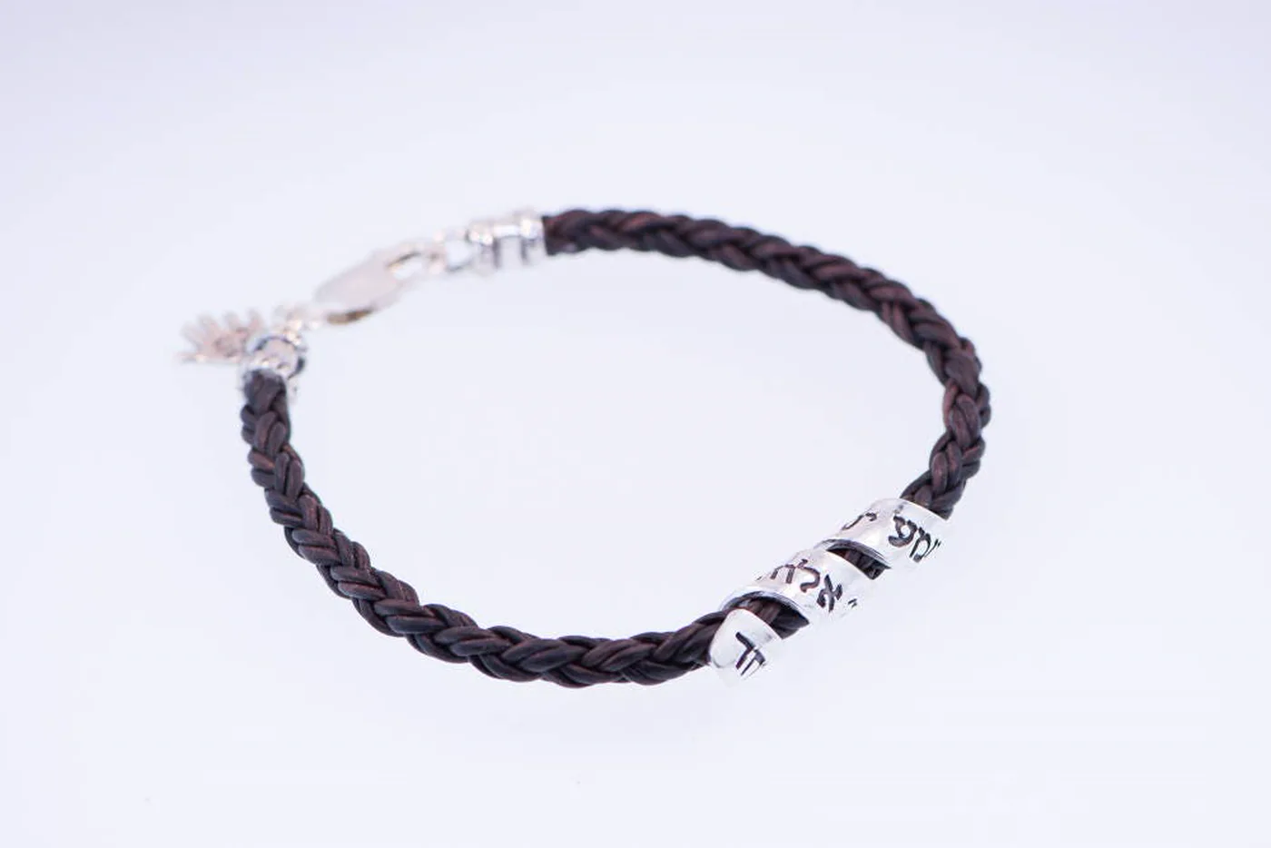 Shema Israel bracelet, braided brown leather with inscribed silver beads