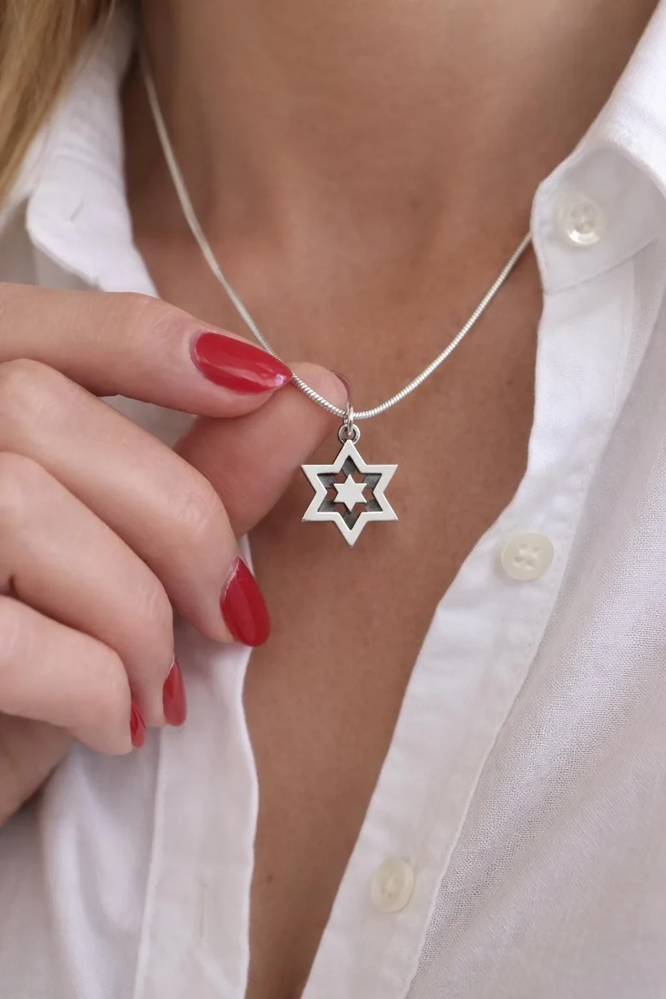 Two David's Stars charm worn