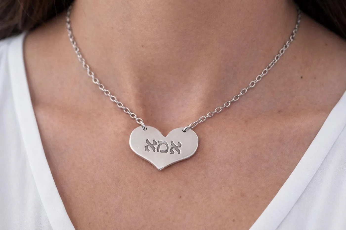 Imma heart pendant worn