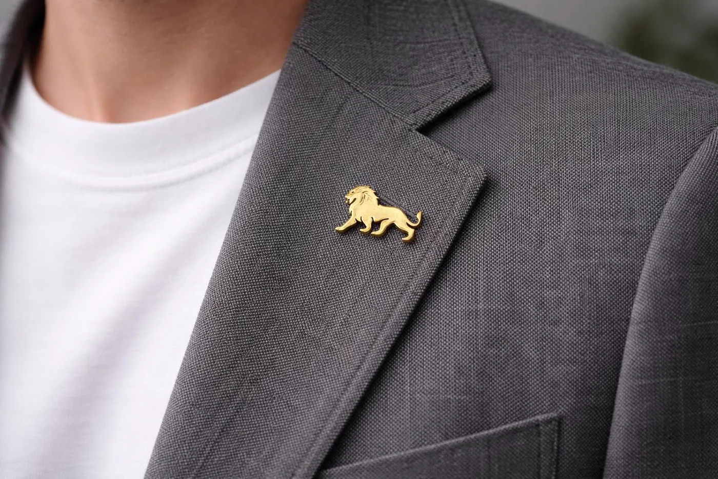 Roaring Lion lapel pin worn on suit